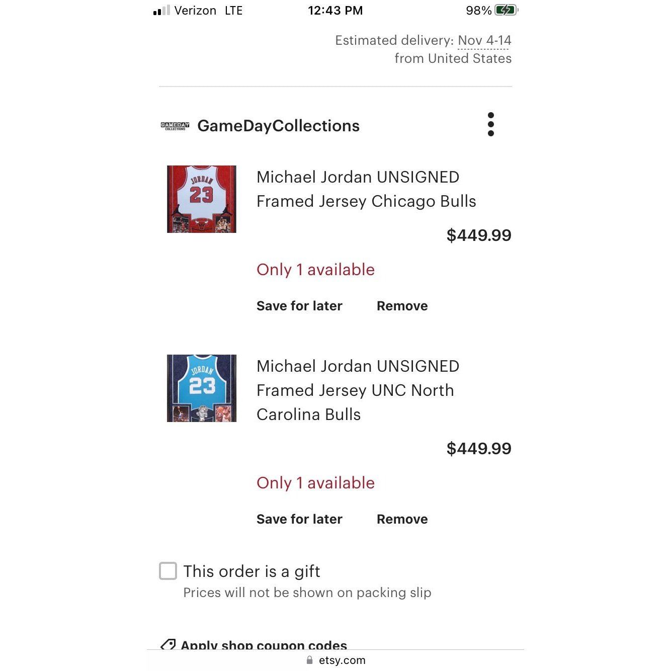 2 unsigned Michael Jordan jerseys UNC and Bulls.
